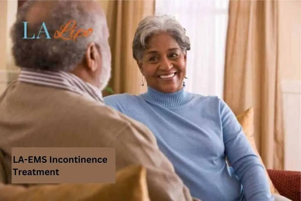 Couple sat smiling at each other - LA-EMS treatment Queensbury