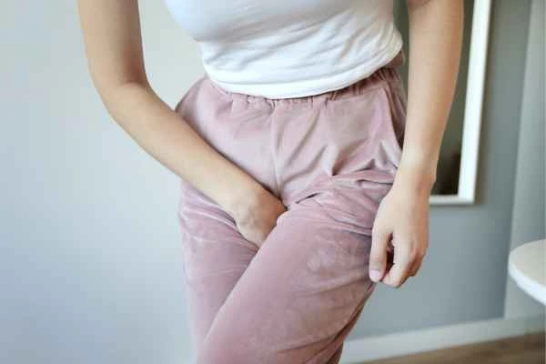 older woman running to the toilet because of urinary incontinence Queensbury
